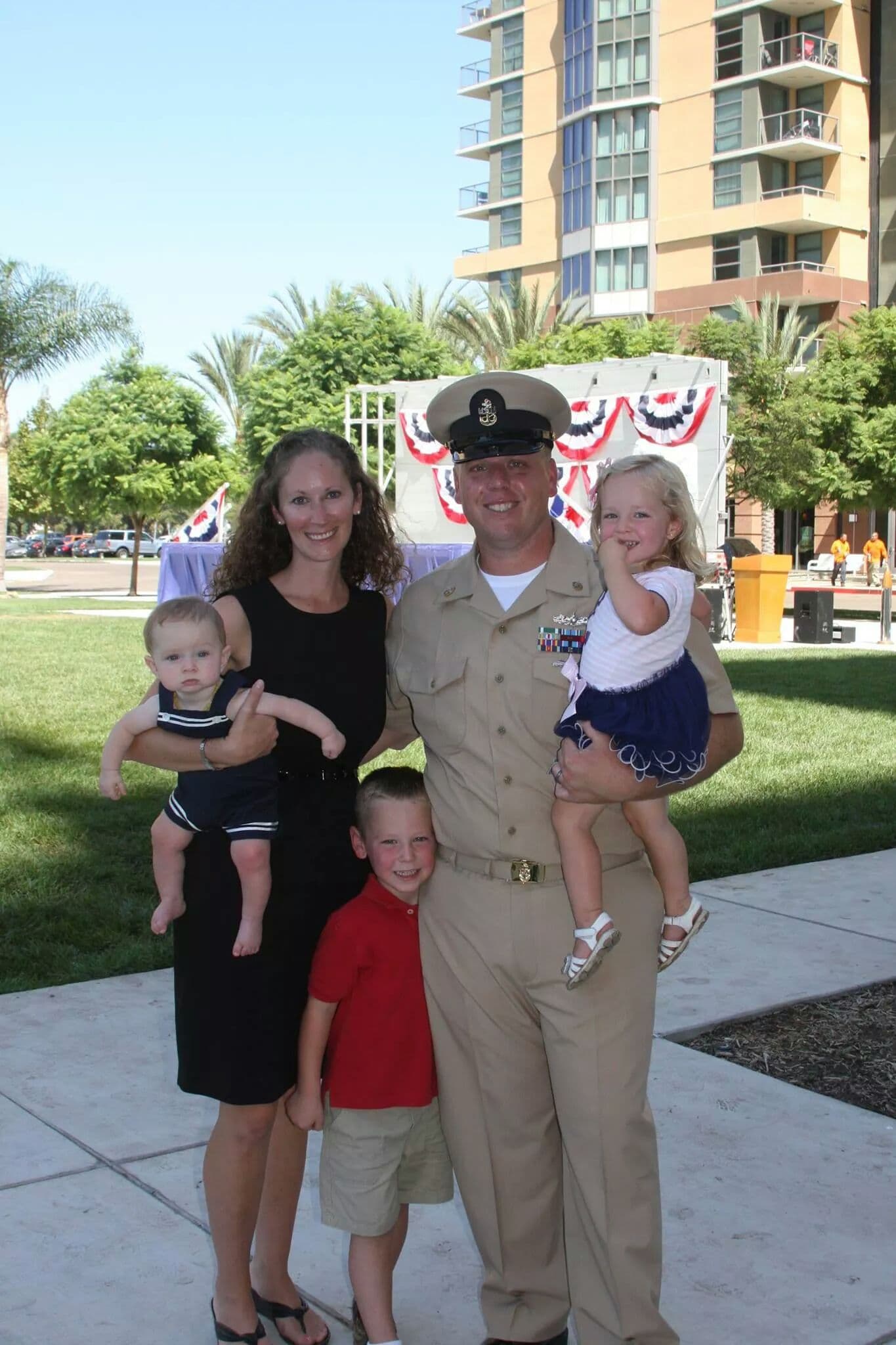 Nathan and his family at a Navy ceremony